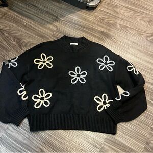Promesa Black Crewneck Sweater with Floral Design